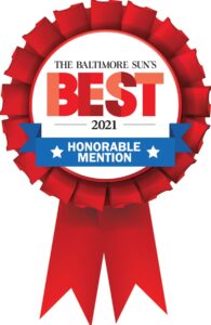 A red ribbon with the words " best 2 0 2 1 honorable mention ".
